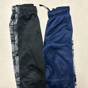 2 play condition Nike sweatpants youth medium blue and black joggers